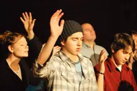 Young people worshiping the Lord
